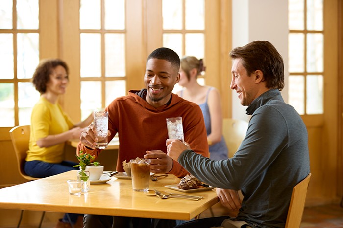 guys at restaurant with ice water