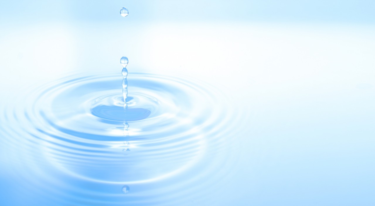 water drop into still water illusion background